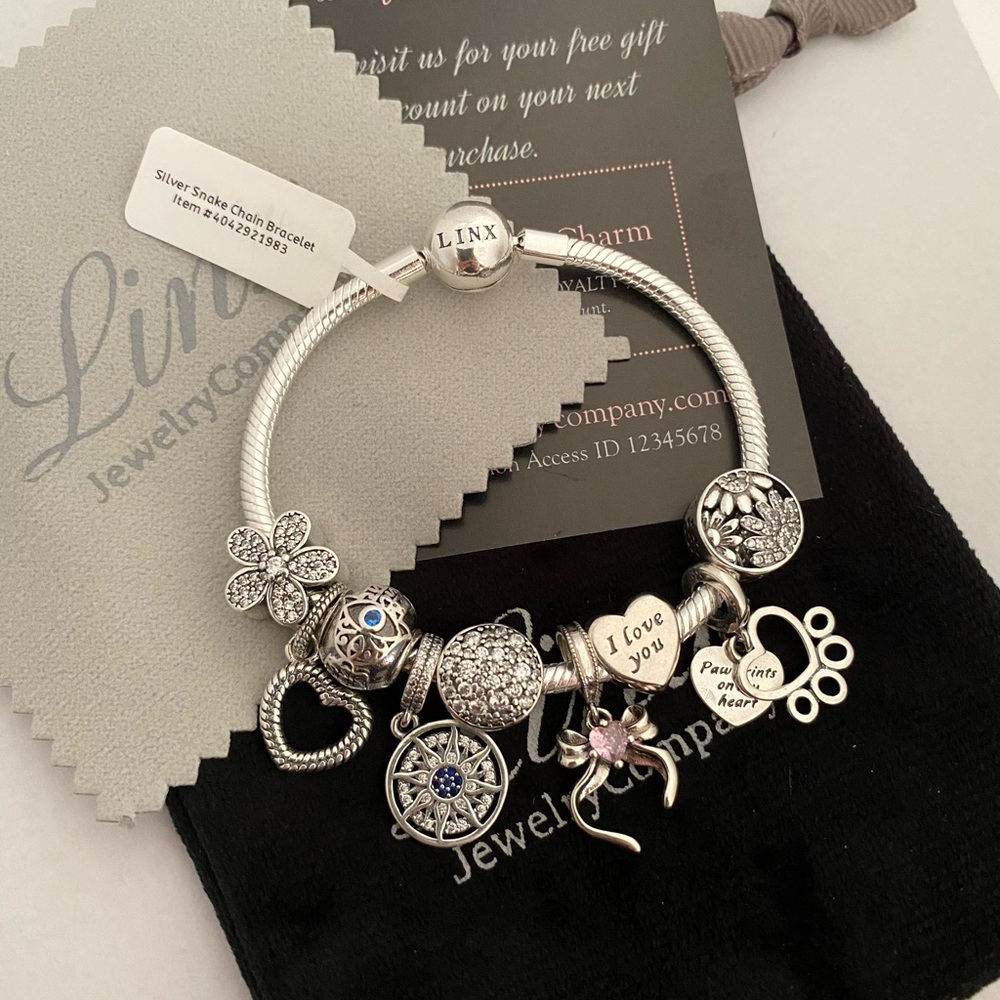 Linx Snake Chain Bracelet with 9 Linx Themed Charms 925 sterling silver